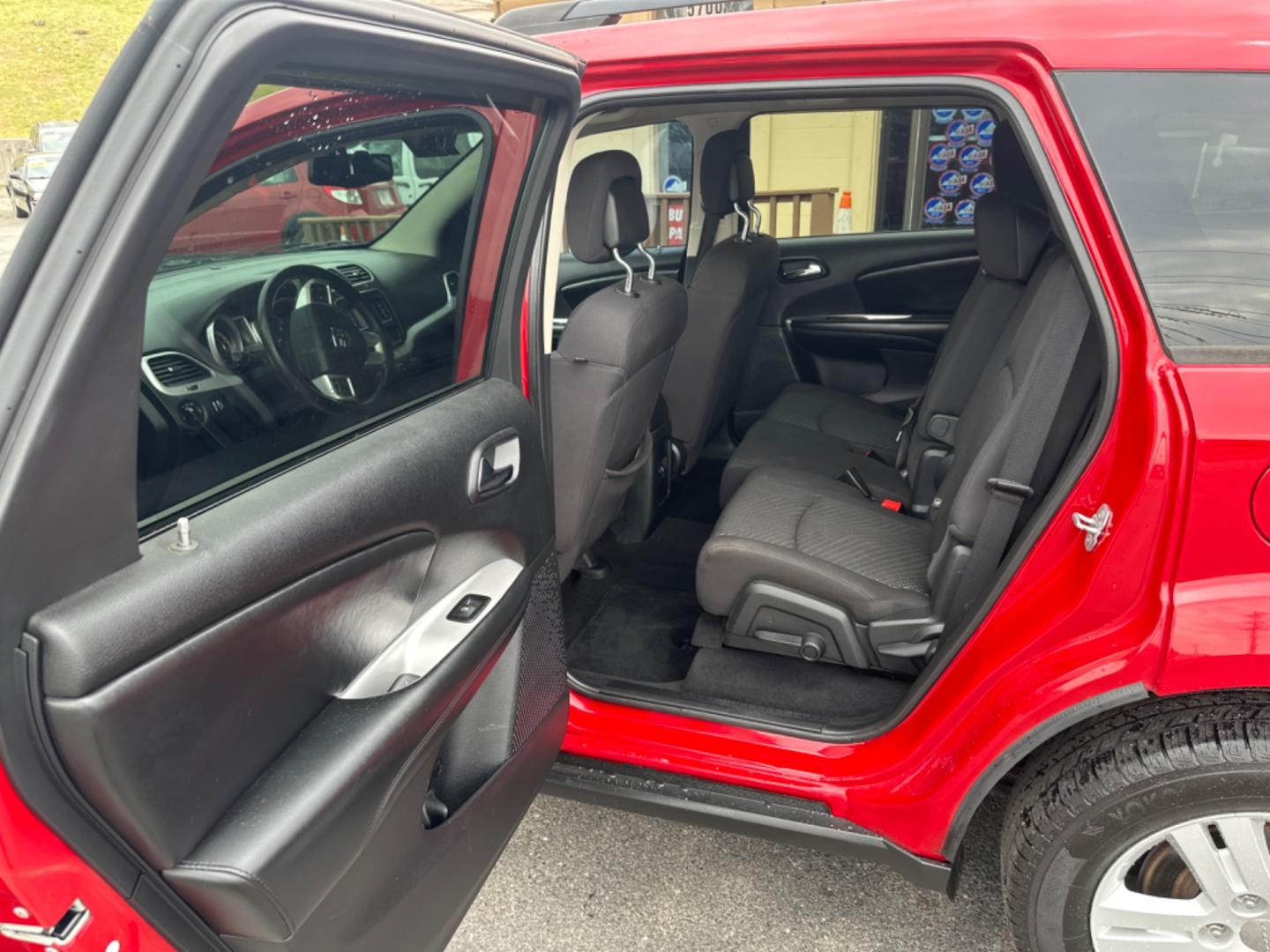 2012 Red /black Dodge Journey SE (3C4PDCAB8CT) with an 2.4L L4 DOHC 16V engine, 4-Speed Automatic transmission, located at 5700 Curlew Drive, Norfolk, VA, 23502, (757) 455-6330, 36.841885, -76.209412 - Photo#8